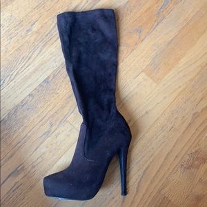Brown suede knew high, high heeled boots